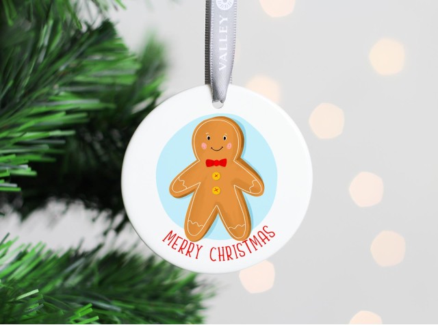 White ceramic welsh christmas tree decoration with the image of a cute gingerbread man